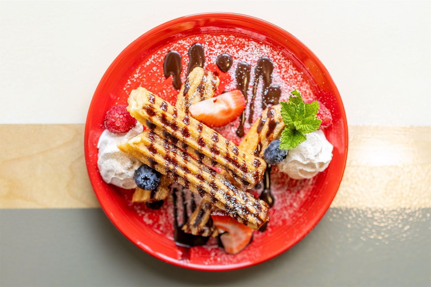 Churros with chocolate drizzle